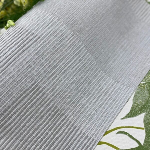 Textura de papel tapiz color gris con líneas