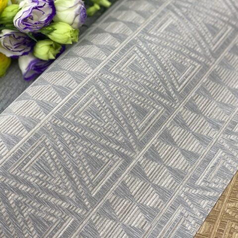 Textura de papel tapiz color gris con figuras triangulares